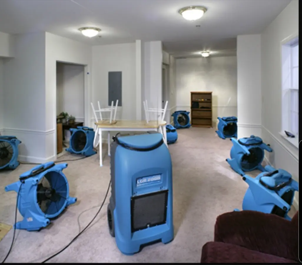 Air movers and dehumidifier setup for Water Extraction & Removal in Chippewa
